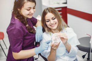 girl sitting in the dentist's office